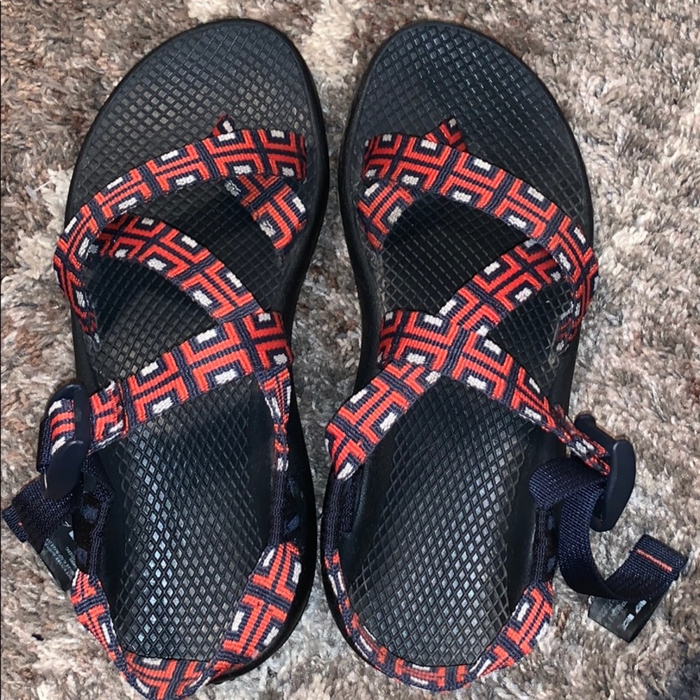 Navy blue and red chacos